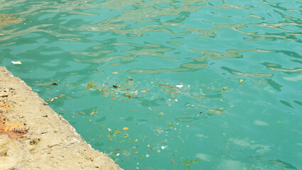 dirty water garbage ocean access wood pattern sea brown outdoor muddy view texture wave river