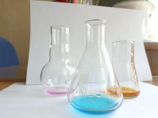 Chemical glassware in a chemistry lesson. Demonstration experience.