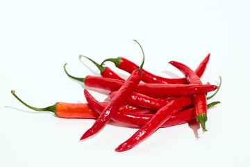Pile of Red Hot Peppers on White Table