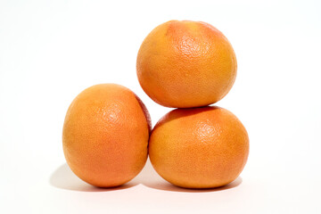 Three Oranges Stacked on Top