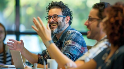 An advertising manager gestures enthusiastically while sharing their vision for a new product launch with their team during a meeting.