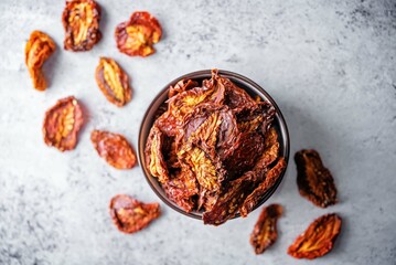 Sun-dried tomatoes on a background