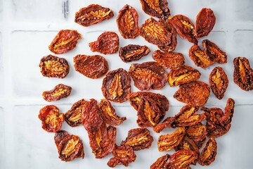 Sun-dried tomatoes on a background