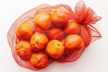 Fresh oranges arranged in a mesh bag on a clean white table, ready for use or display - Powered by Adobe