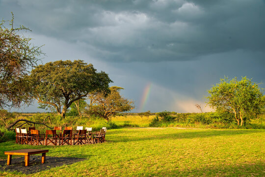 Afternoon Sun and Rainbow Light a Serengeti Campsite