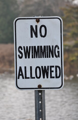 No swimming allowed signpost