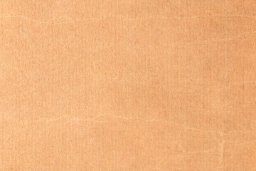 Tan background with a few small brown spots, texture background of retro vintage yellowed paper