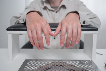 Male hands with beautiful natural elegant manicure. Manicure in a luxury beauty SPA salon. Concept nails and hands care 