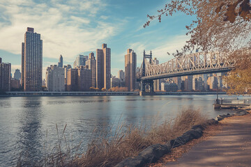 Naklejka premium Landscape photography of the Brooklyn Bridge in New York City, USA. View from the East River embankment to Manhattan