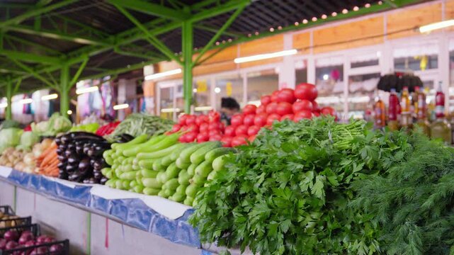 a grocery store or market filled with variety of fruits and vegetables, with blurred background, buyers and sellers in city center. Street fruit shop with fresh fruits and vegetables