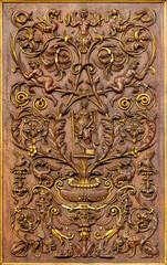 PERUGIA, ITALY - MAY 16, 2024: The detail of carved renaissance stalls in the church Cattedrale di San Lorenzo (St. Lawrece cathedral) by unknown artist. 