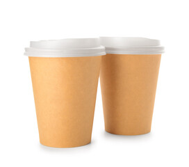 Beige takeaway coffee cups on white background