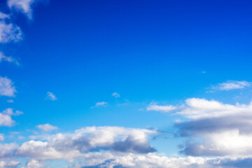 low clouds on the blue sky. good weather forecast. sunny afternoon in winter