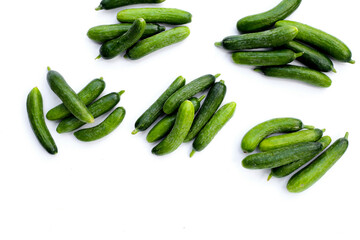 Mini cucumbers on white background.