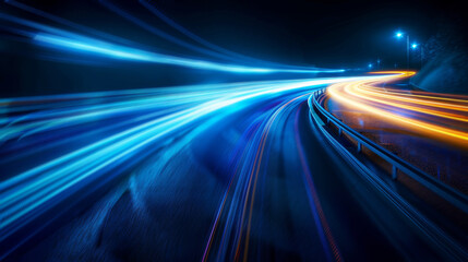 Dynamic blue and orange light trails on a curving highway at night