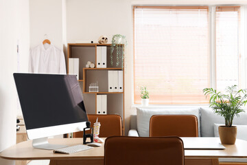 Obraz premium Doctor's workplace with computer monitor in medical office