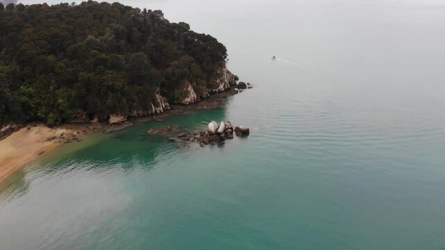 aerial panorama of split apple beach (towers bay) - famous bay with unique geological formation near abel tasman national park, new zealand south island