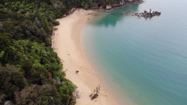 aerial panorama of split apple beach (towers bay) - famous bay with unique geological formation near abel tasman national park, new zealand south island