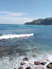 Menganti Beach, Kebumen: View of fishermen on the beach after returning home to fish