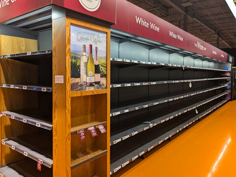 Empty wine and beer shelves at the liquor department of a local grocery store Loblaws during July LCBO (Liquor Control Board of Ontario) strike in the province of Ontario, Canada.
