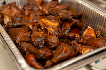 BBQ chicken wings catered at a party 