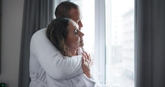 Love, dance and couple at window for morning bonding, care or gratitude, peace or security at home. Hotel, travel or calm people embrace on romantic vacation for anniversary, honeymoon or celebration