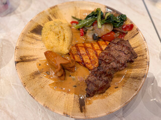 beef steak in ceramic plate