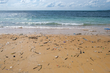 Pollution: garbages, plastic, and wastes on the beach