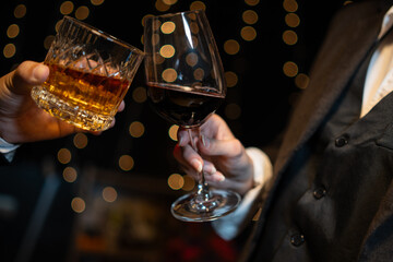 Celebrate whiskey on a friendly party in  restaurant.