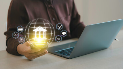 Buy now pay later online shopping concept. Hands holding mobile phone on blurred store as...