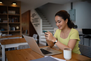 Woman sitting working with laptop at coffee shop freelance woman working outside Concept.