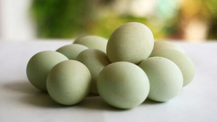 Duck eggs on white background. Ready to cook.
