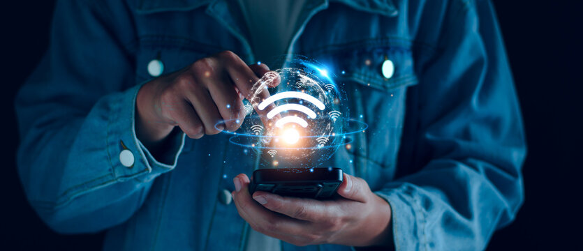 Internet wifi fast connect concept, Man holding smartphone access high speed internet connect global network data, fast internet wifi hotspot sharing