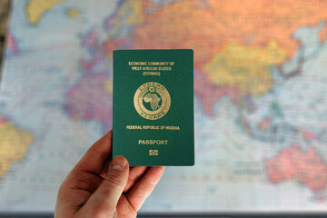 Sierra Leone passport in man hand