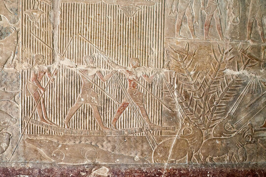 Mural from the mastaba of Mereruka with three men on a boat hunting hippopotami and fishing in the marshes, Saqqara