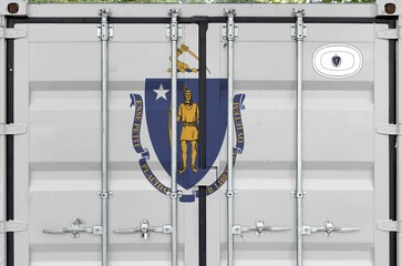 Massachusetts US state flag depicted on metal doors of shipping cargo container outdoors in docks...