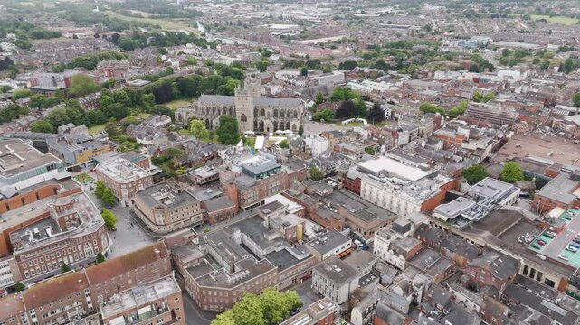 Drone view of market stalls pitched on the Cathedral Green in central Exeter, Devon, UK, during an event