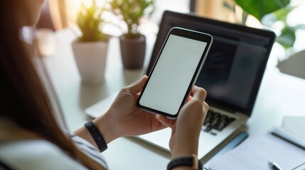 Businesswoman Holding Phone with White Screen Display in Office