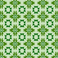 Decorative print .Flower geometric pattern. Seamless background. green and pink ornament. Ornament for fabric, wallpaper, packaging. 
