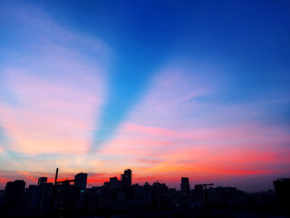 The beautiful sunset over city.