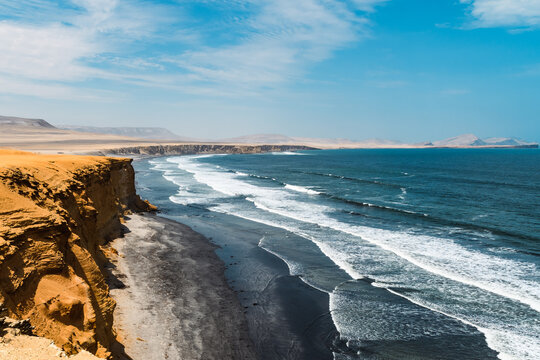 Tranquil Shores of Paracas. Paracas Reserve&rsquo;s serene coastline marries desert and sea under azure skies.