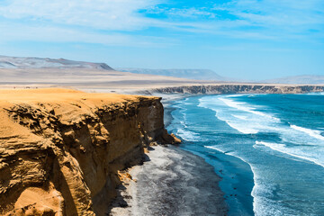 Serene Paracas. Paracas Reserve’s Coastal Majesty: Cliffs Meet Ocean