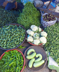 Explore a bustling Indian food marketplace adorned with colorful, fresh vegetables. It’s a feast...