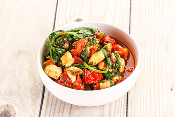 Chicken with tomato and spinach