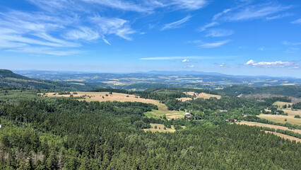 Landscape, view from the mountain to a mountain valley with fields and meadows. Poland