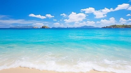 Fototapeta premium Expansive tropical beach panorama seascape horizon meeting sky and sea in a mesmerizing display