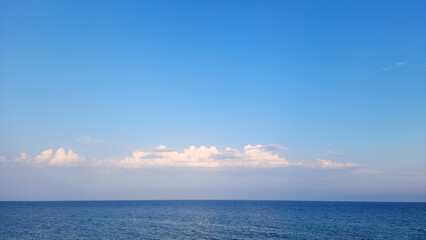 White clouds over the eastern Mediterranean Sea in the evening of a day in july