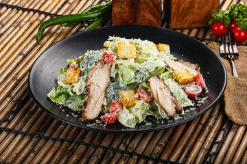 Caesar salad with chicken and romano