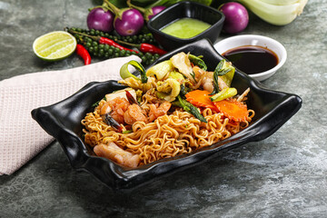 Asian cuisine - Fried noodles with seafood