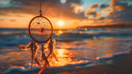 Dreamcatcher on a beach, captured at sunset with a tranquil and dreamy atmosphere